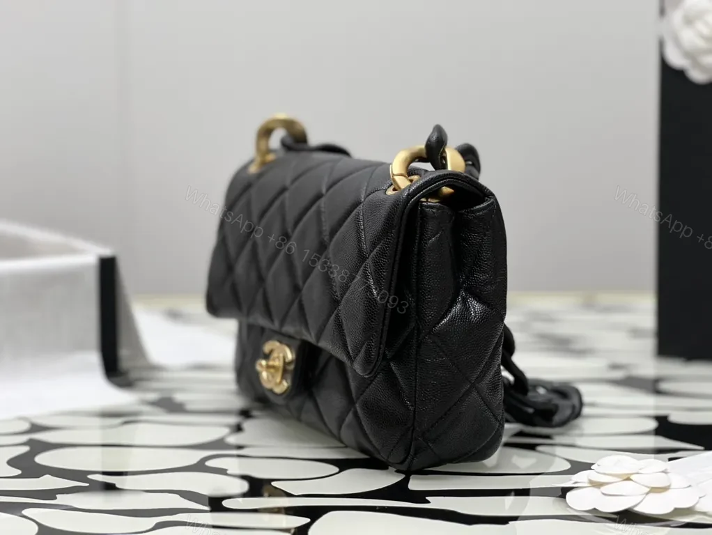View 7 of Compact Quilted Black Flap Bag with Gold Hardware, Chain Carry