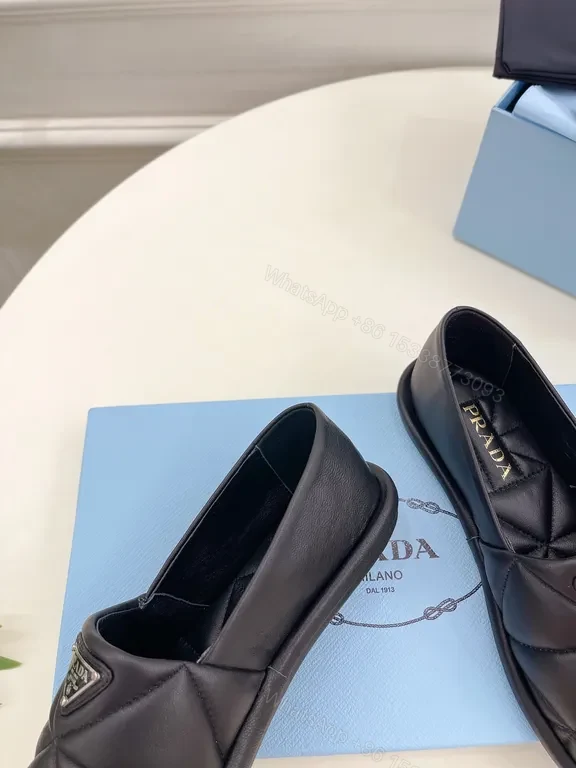 View 8 of Quilted Leather Slip-Ons with Prada Triangle - All-Day Comfort