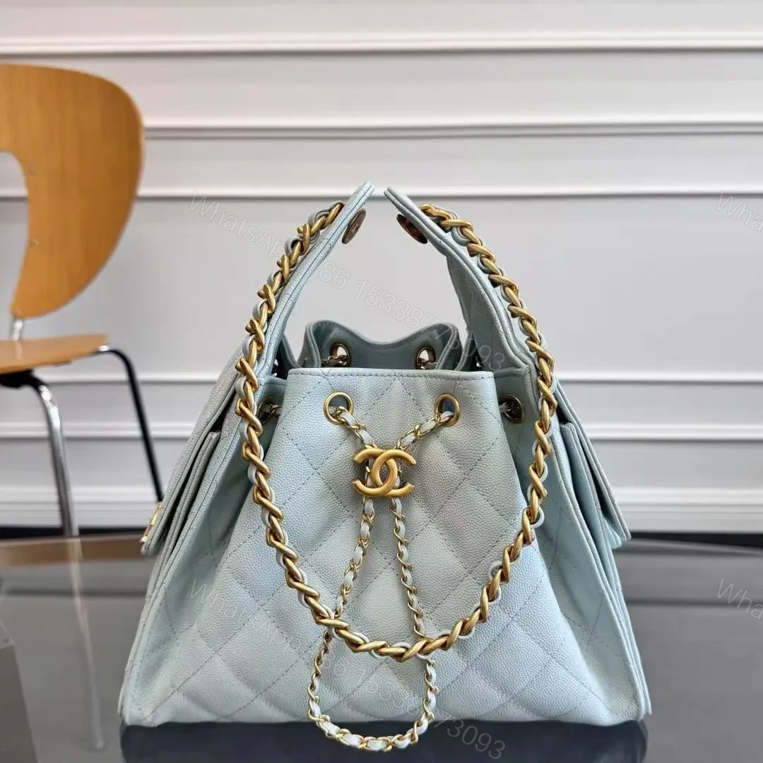 CHANEL 25 HANDBAG 30 IN LGITH BLUE CAVIER GOLD HARDWARE — view 1