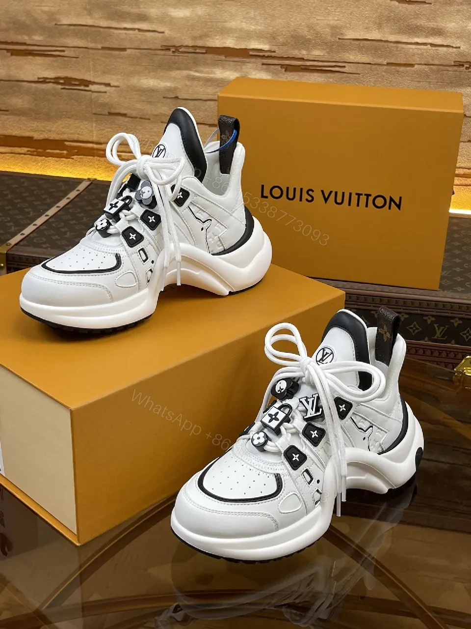 View 9 of Premium Leather High-Top Sneakers with LV Embellishments