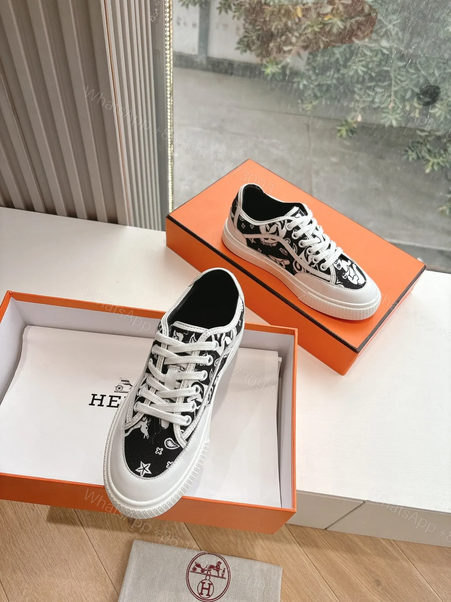 View 3 of Hermes Women Black White Canvas Sneakers