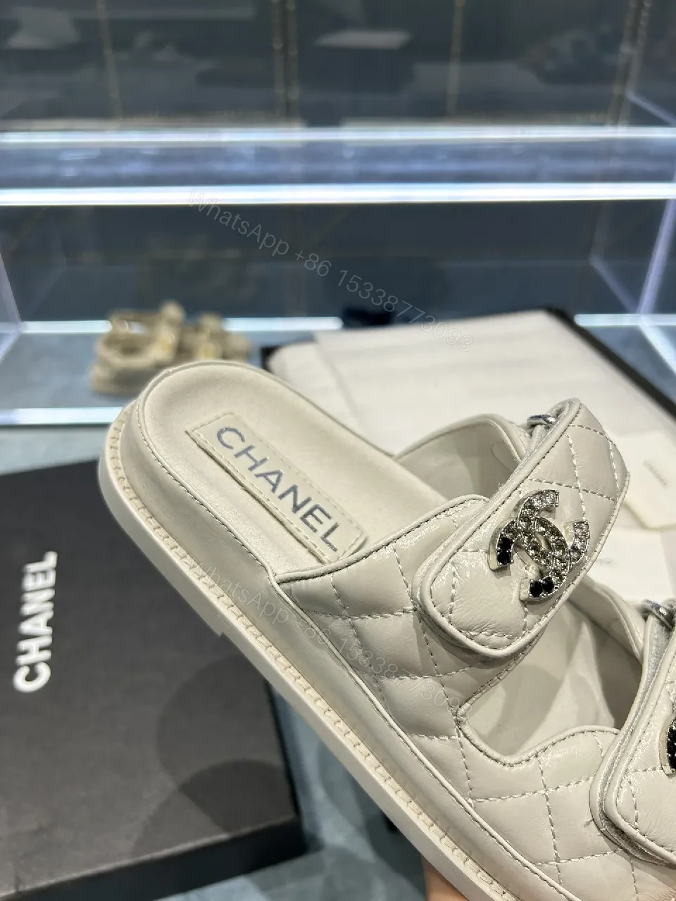 View 7 of Chic White Sandals with Quilted Straps and Logo Hardware