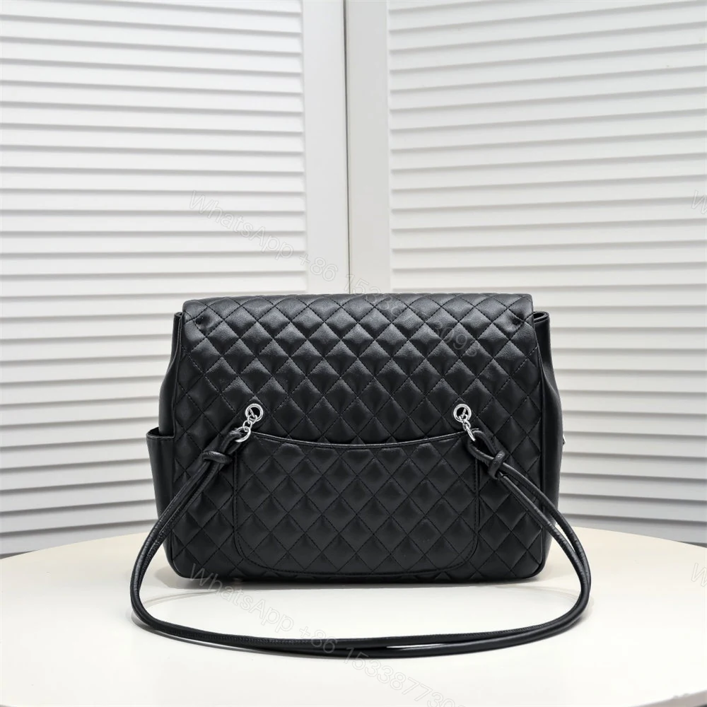 View 8 of CHANEL Black Lambskin Cambon Handbag