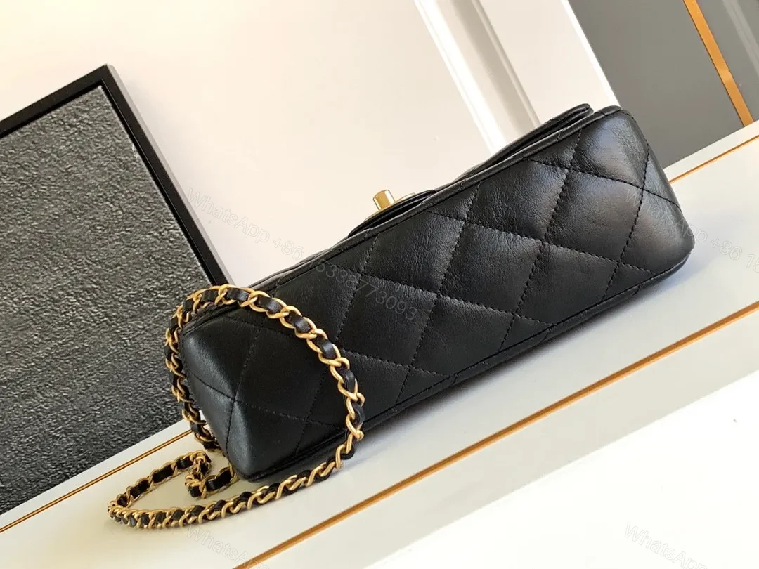 View 5 of Compact Dark Leather Quilted Flap Bag with Gold Hardware