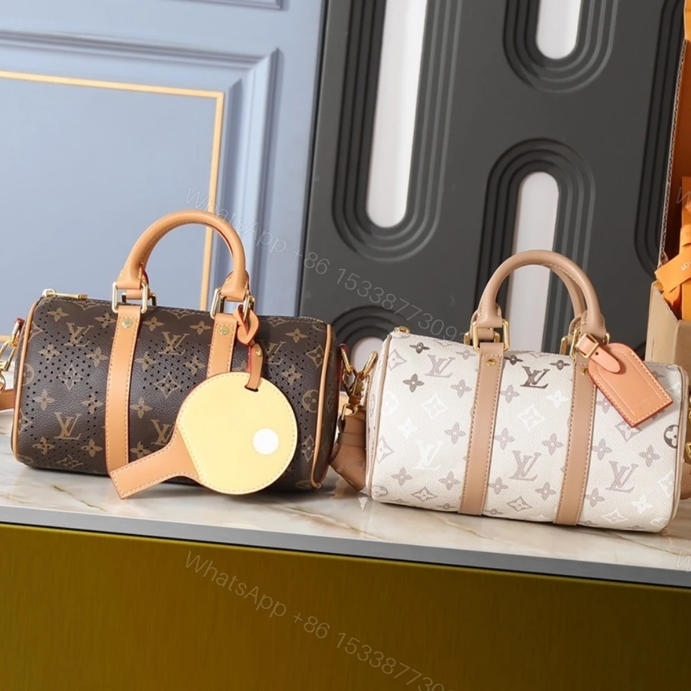 View 11 of Louis Vuitton Keepall Bandoulière 25 Monogram Beige 25Cm