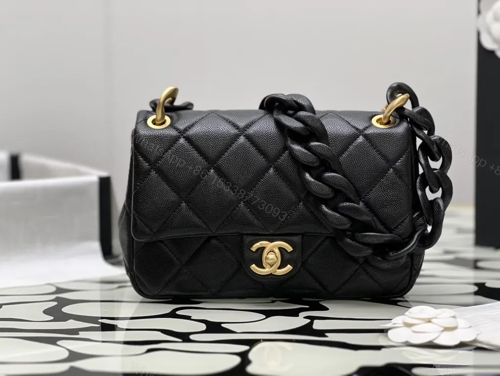 View 5 of Compact Quilted Black Flap Bag with Gold Hardware, Chain Carry