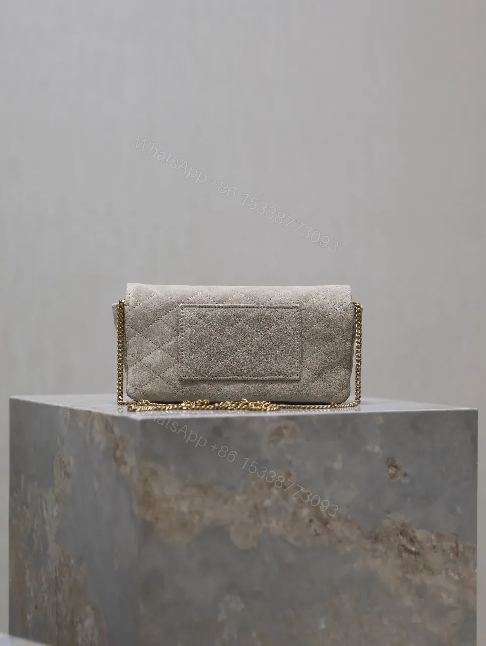 View 3 of Quilted Suede Clutch with Gold Logo Hardware - Classic Chic Clutch