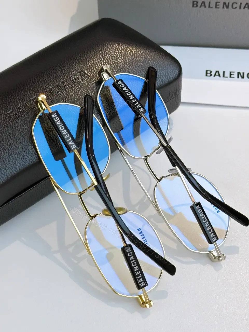 View 4 of Silver Metal Aviator Sunglasses: Luxe Slim Frames with Logo Detailing