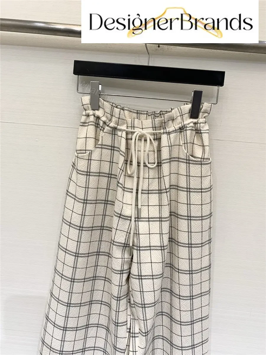 View 3 of Acne Studios Off-White Drawstring High-Waisted Wide-Leg Trousers