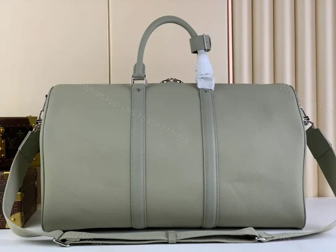 View 3 of LOUIS VUITTON KEEPALL BANDOULIÈRE 50 IN GREY – LBV424