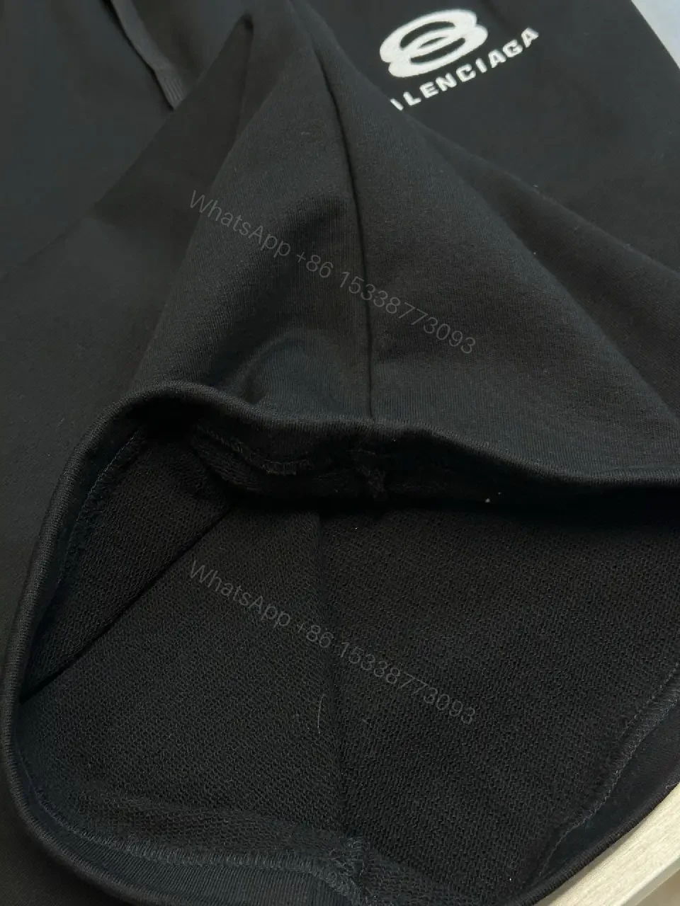View 4 of Chic Black Wide-Leg Track Pants with Subtle Logo