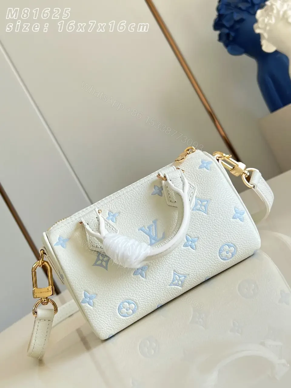 View 5 of Soft White Mini Satchel – Textured Leather, Light Blue Accents, Luxury Everyday Carry