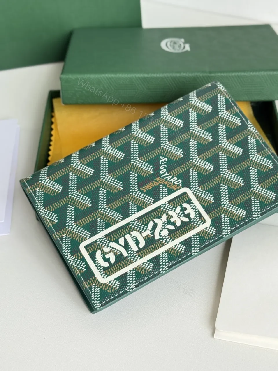View 8 of Green Canvas Compact Wallet – Signature Pattern, Bi-Fold Luxury