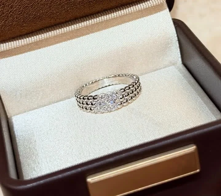 View 4 of Van Cleef & Arpels Perlée 3 Rows Diamond White Gold Ring TJ620