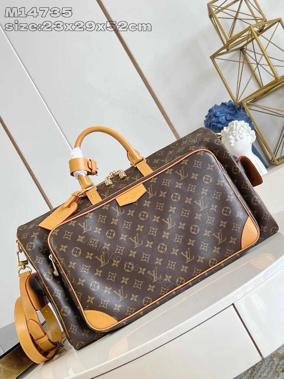 Monogram Leather Carryall: Luxe Travel Tote with Structured Durability — view 1