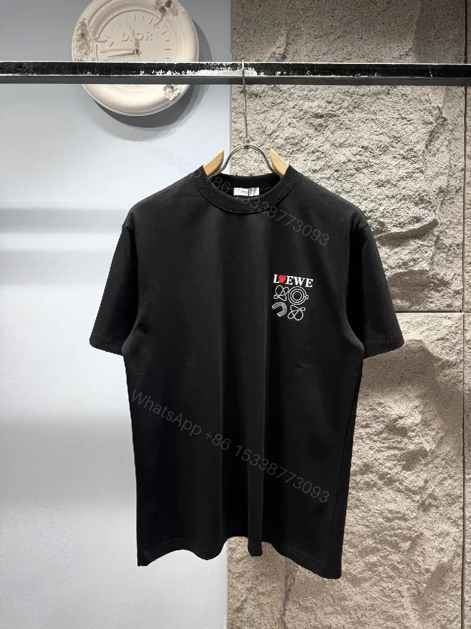 Black Cotton Tee with Subtle Embroidered Graphic, Minimal Luxury, Everyday Wear — view 1