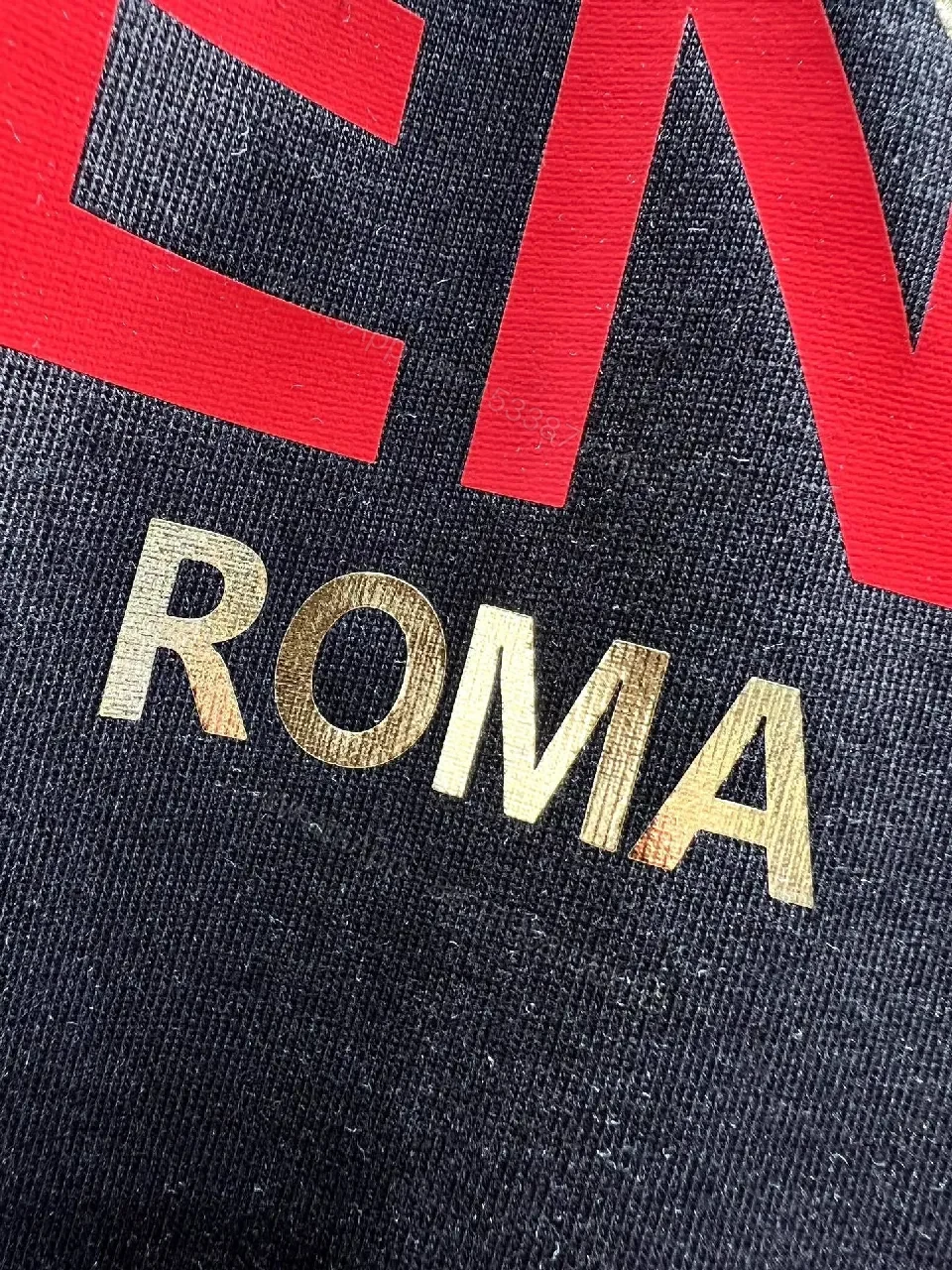 View 11 of Bold Black Tee with Red Fendi Logo Film-Glow