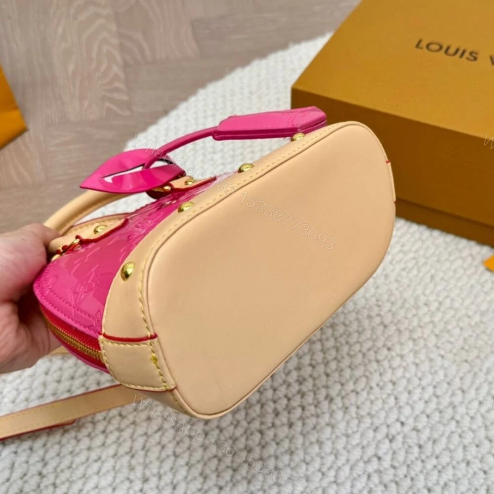 View 7 of Louis Vuitton Alma Nano Monogram Vernis Embossed Neon Pink 18Cm M90611