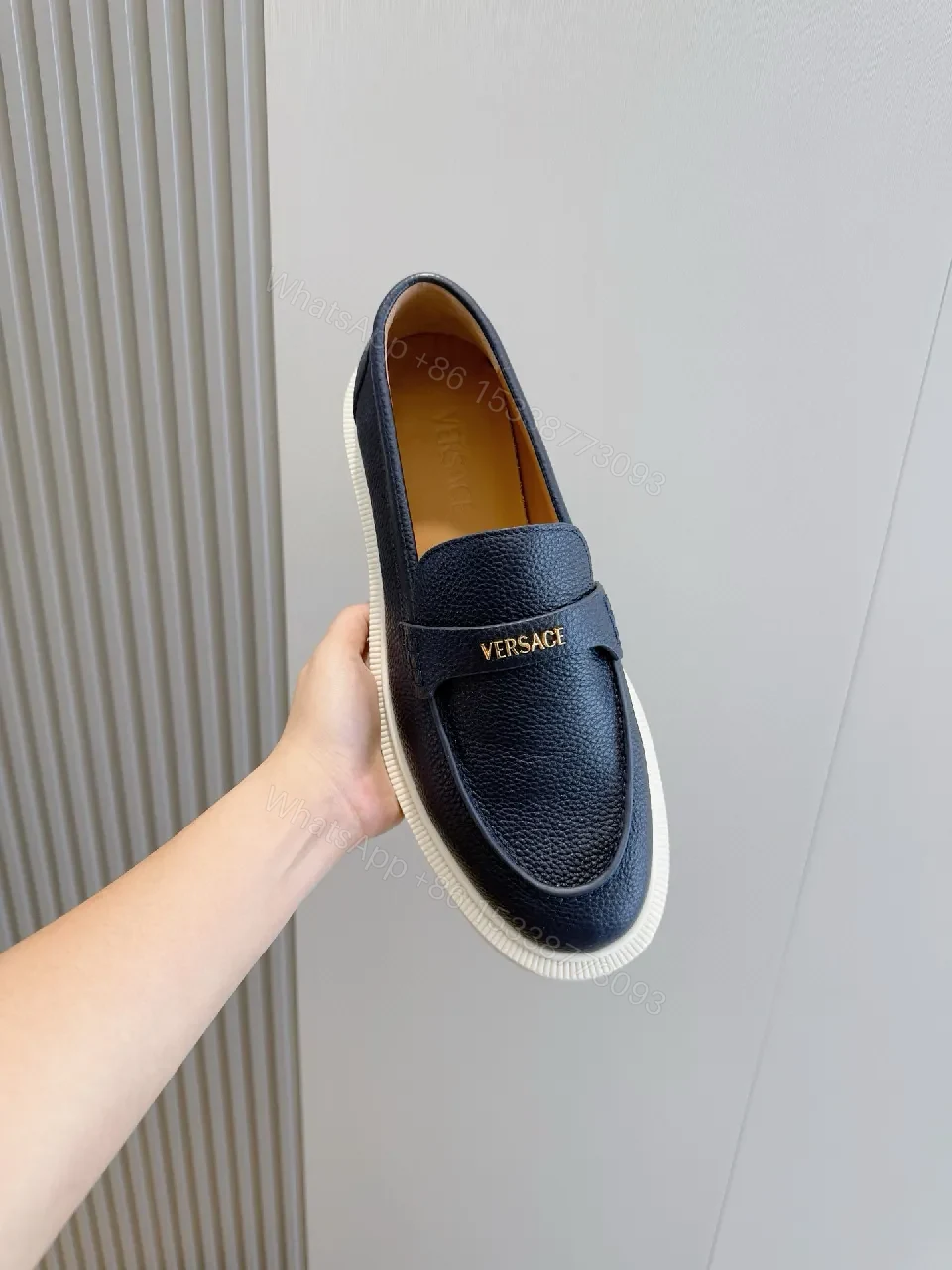 View 4 of Navy Leather Slip-On Loafers with Gold Branding