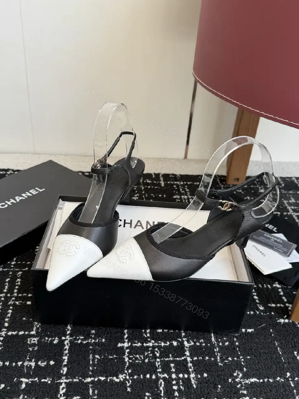 View 7 of Black White Leather Slingback Heels with Chanel Logo, Pointed Toe, 2-inch Heel