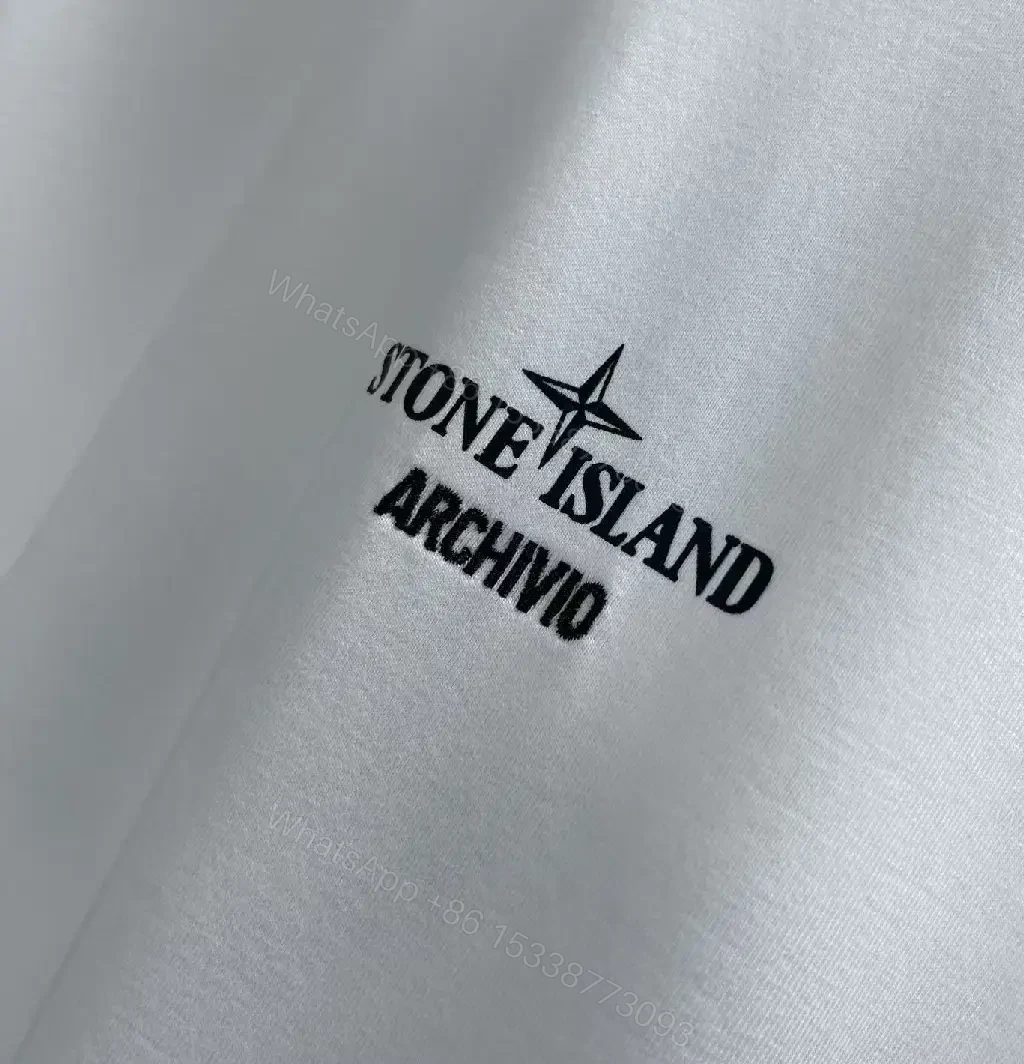 View 7 of Minimalist White Tee with Subtle Logo – Premium Everyday Comfort
