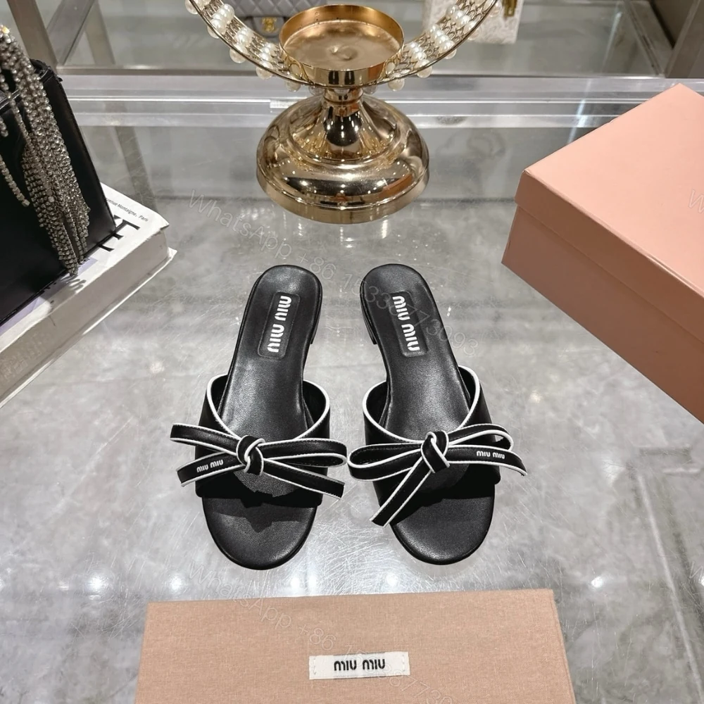 View 2 of MIUMIU MORDORÉ NAPPA SANDALS WITH BOW BLACK