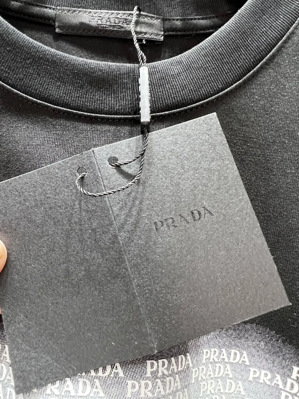 View 7 of Black Graphic Tee: Premium Prada Triangle Logo, Modern Streetwear