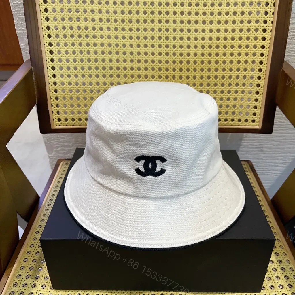 White Cotton Bucket Hat - Luxe Minimalist, Subtle Logo — view 1