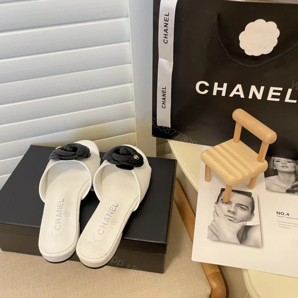 View 3 of Chanel Black Camellia Slides White