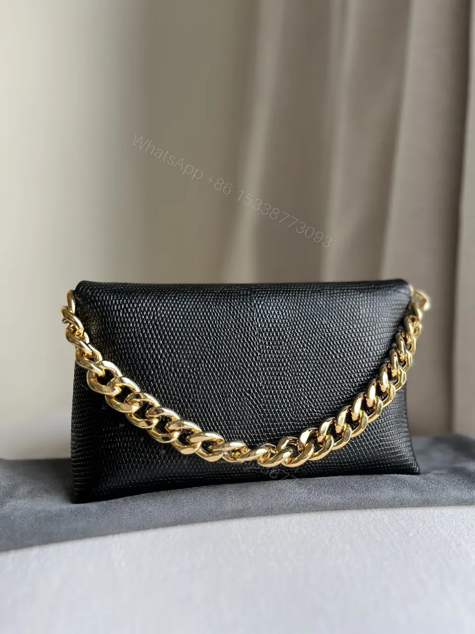 View 7 of Chic Black Leather Wallet with Gold Chain: Luxury, Compact