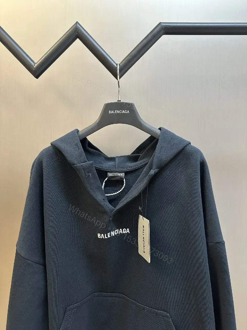 View 4 of Cozy Luxe Hoodie: Subtle Iconography, Everyday Versatility