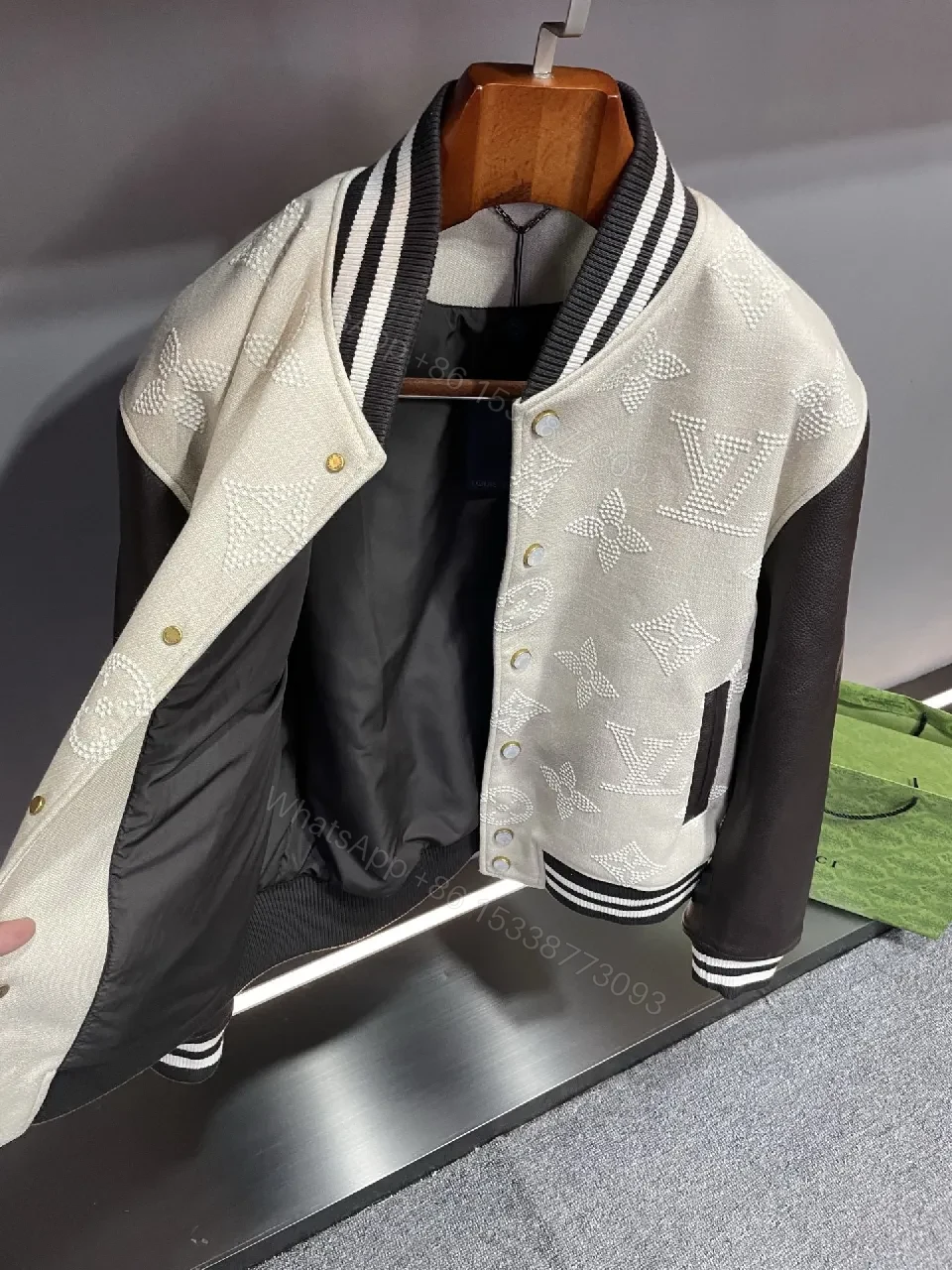 View 5 of Textured Monogram Varsity Jacket: Modern Luxury, All-Day Comfort