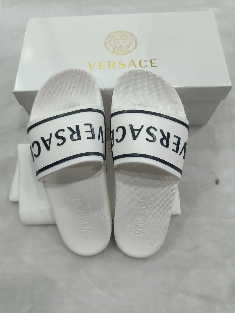 View 4 of White Leather Slide with Bold Brand Stripe, Unisex Comfort
