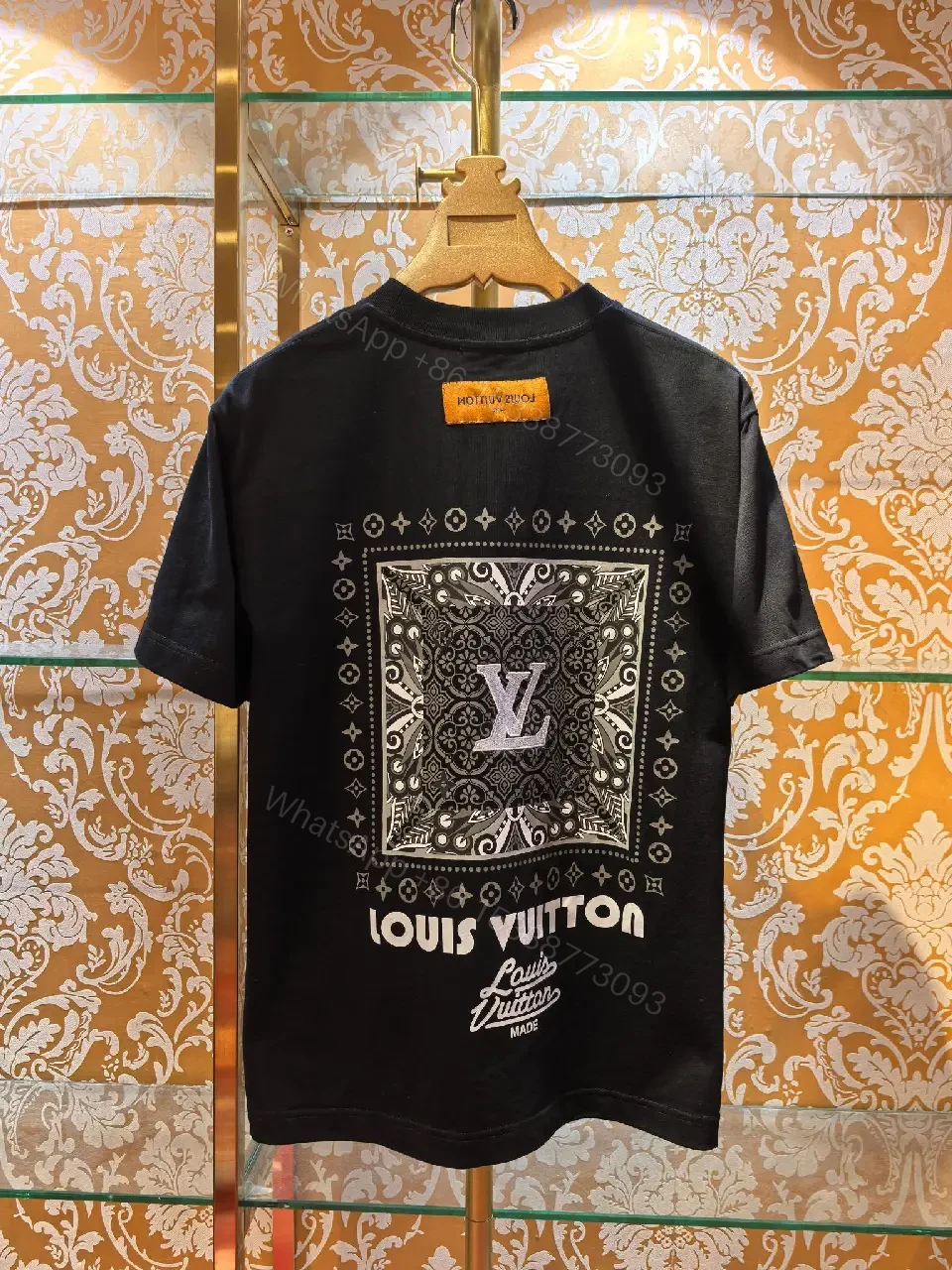 View 3 of Minimalist Black Cotton Tee with Subtle LV Emblem