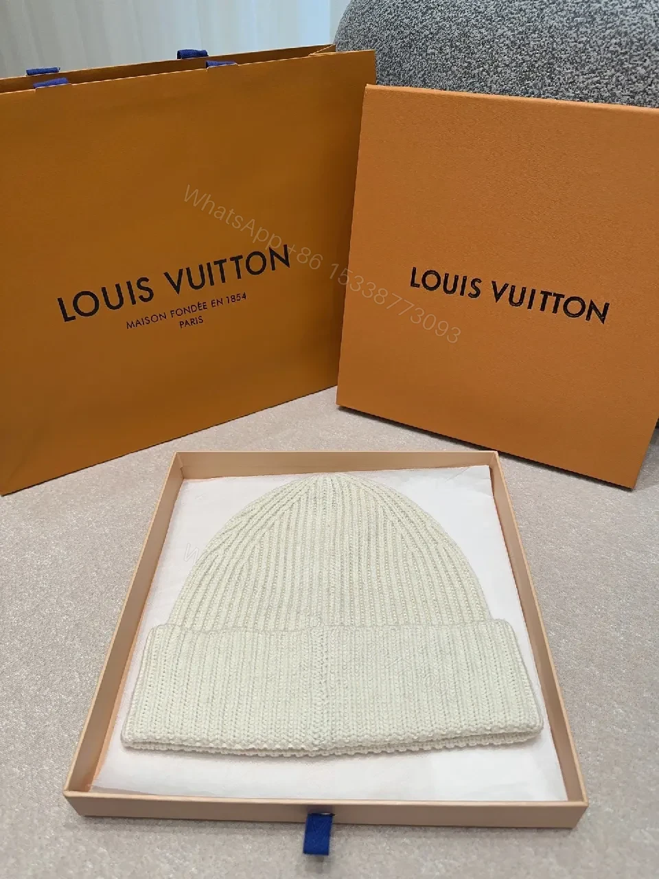 View 2 of Textured Knit Beanie - Ivory Knit w/ LV Accent Fashion Beanie