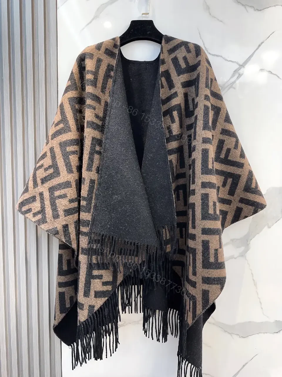 View 2 of Chic Monogram Wool Poncho with Fringe Details