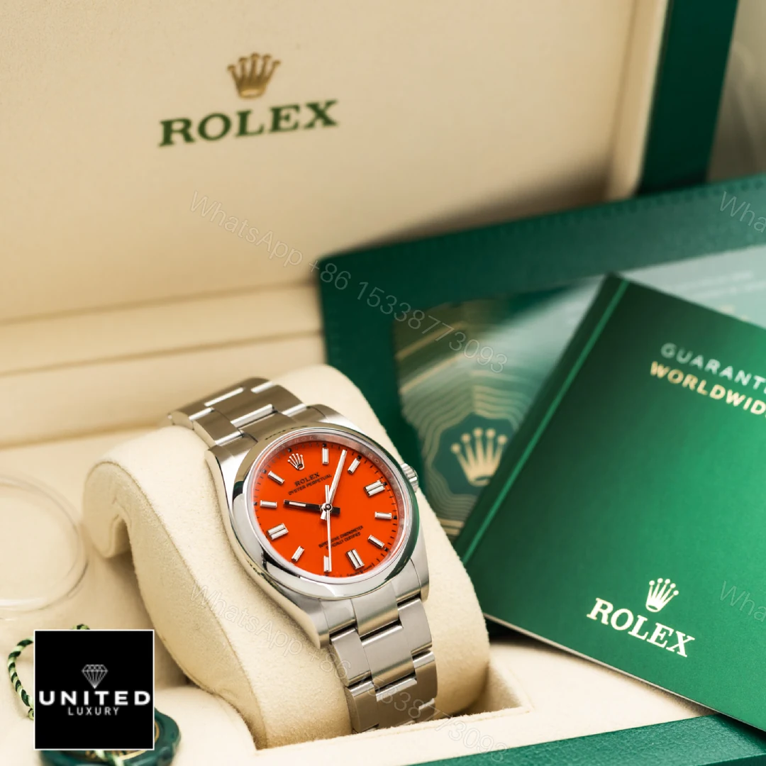 View 8 of Rolex Oyster Perpetual Red Dial 126000 Replica