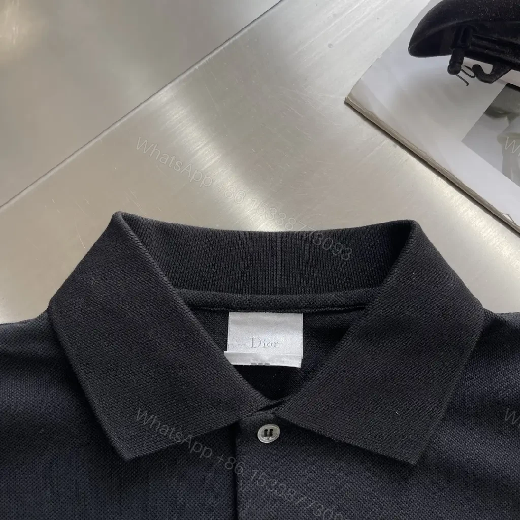 View 8 of Black Polo Tee with Green Clover – Subtle Luxe Everyday Polo