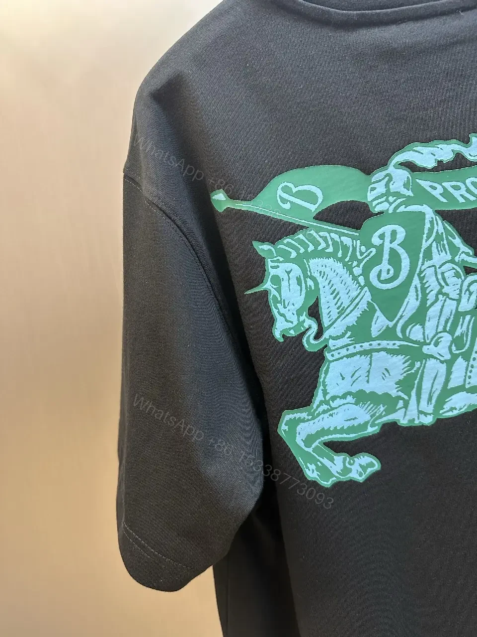 View 2 of Black Knit Oversized Tee Turquoise Burberry Text T-Shirt