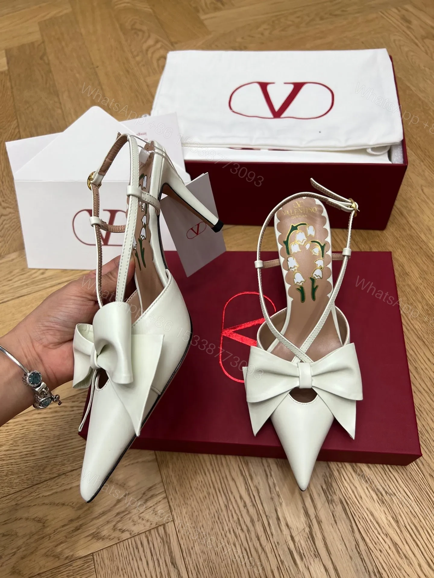 View 3 of Valentino Women White Leather Bow Accent Pumps