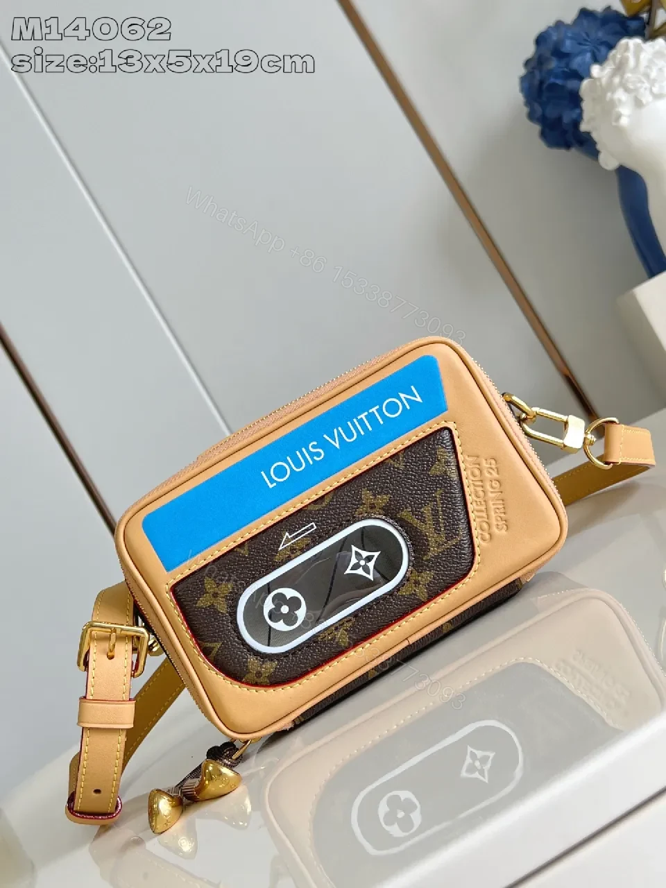 Compact Luxury Crossbody: Monogram Canvas with Blue Accent and Gold Hardware — view 1