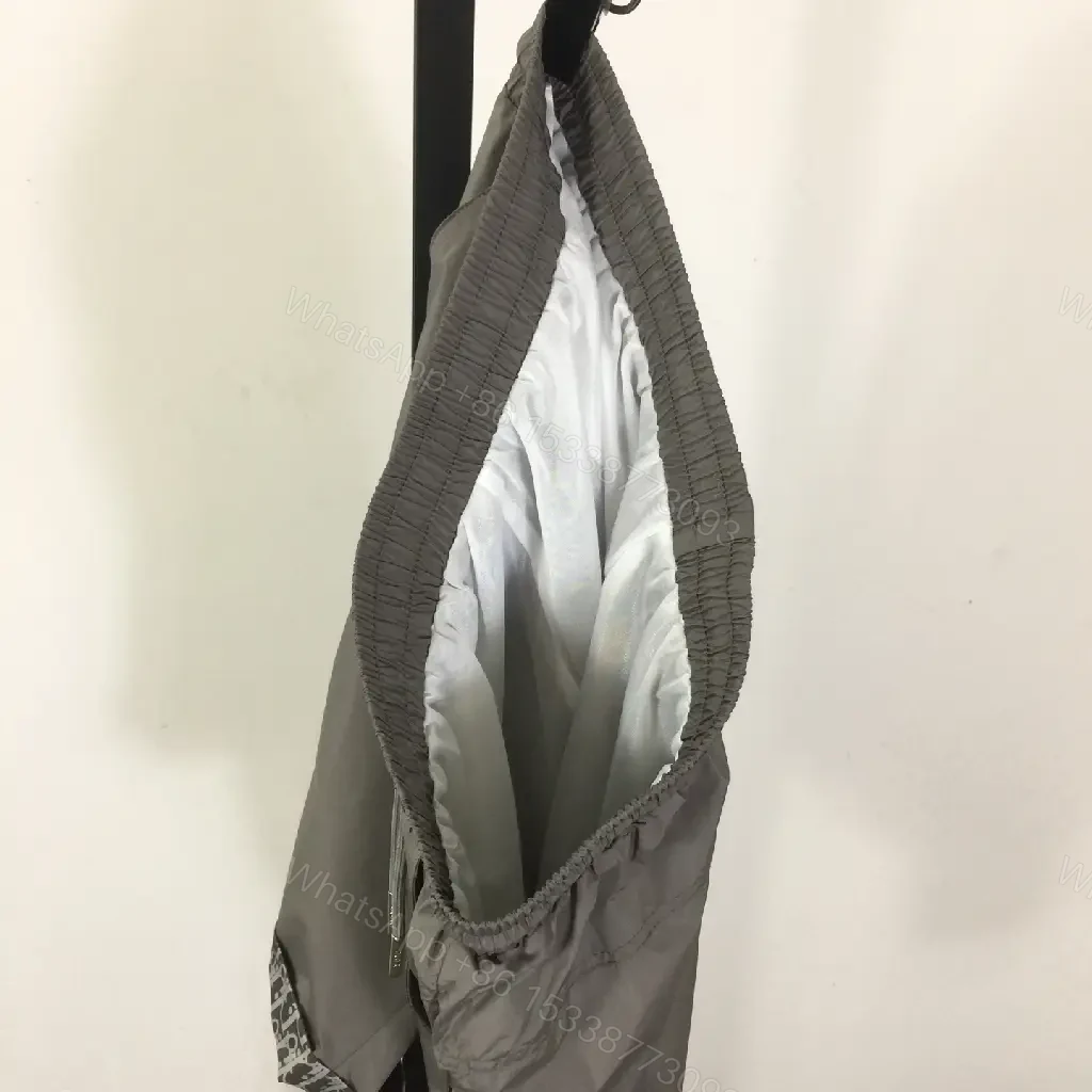 View 10 of Gray Nylon Bermuda Shorts Dior Logo Clip Hem Trim
