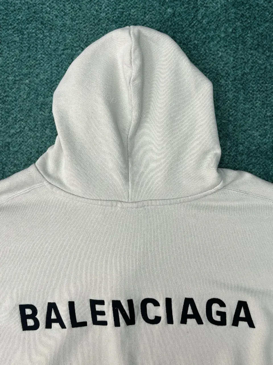 View 9 of Neutral Cotton Blend Minimalist Hoodie with Subtle Logo (Unisex)