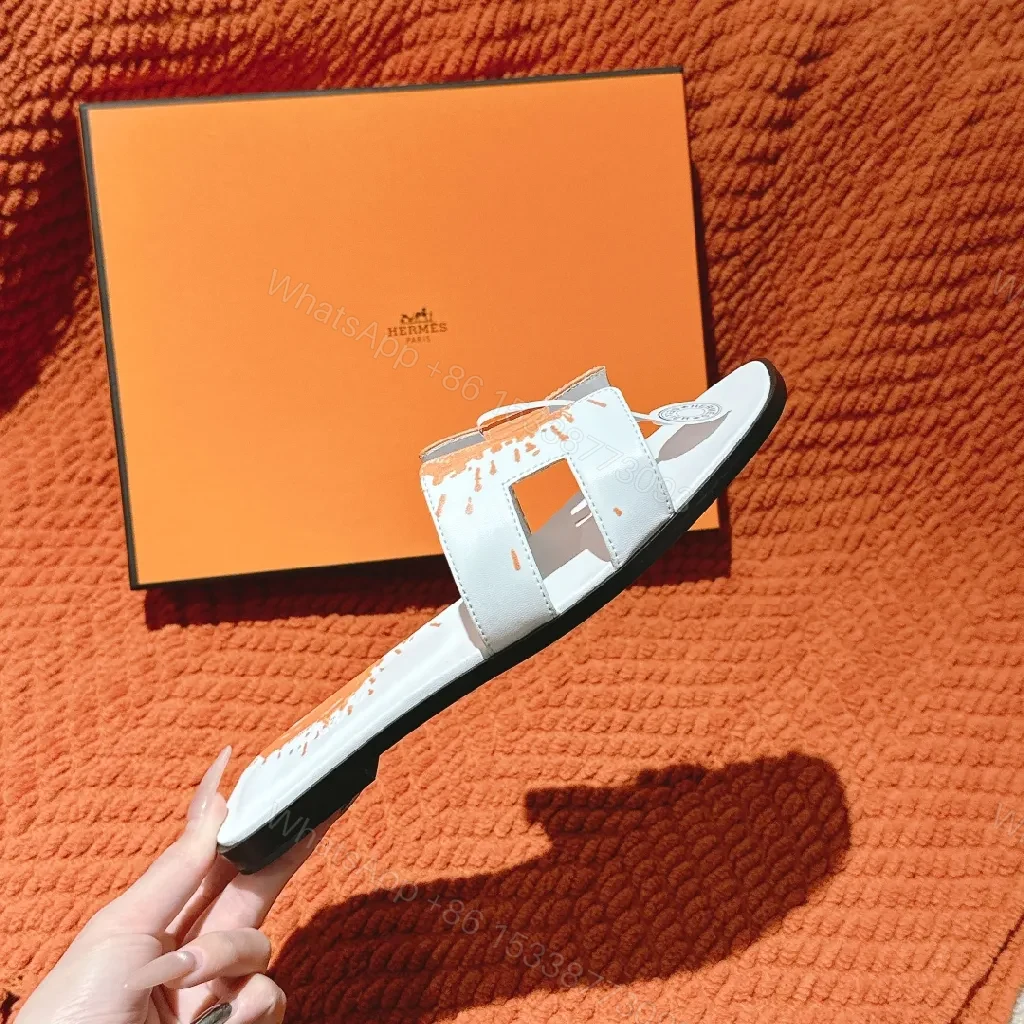 View 9 of Bold Orange-Accent White Leather Slides, Comfort-Chic Street Style