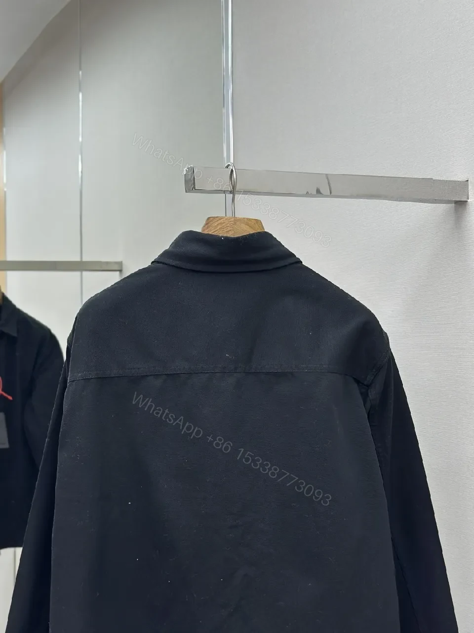View 2 of Black Cotton-Blend Minimalist Shirt Jacket with Subtle Embroidery