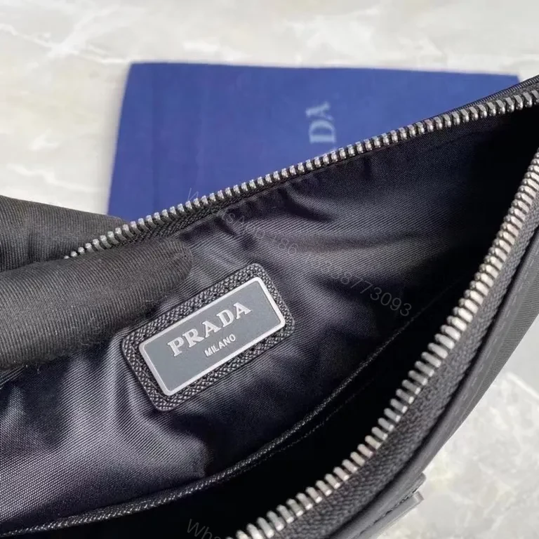 View 2 of Prada Re-Nylon Compact Pouch: Sleek, Everyday Luxury