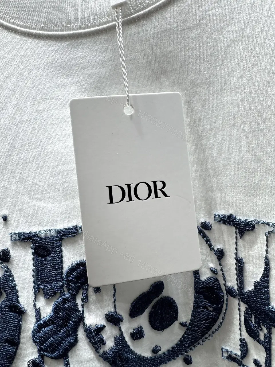 View 9 of White Cotton Tee with Distressed DIOR-Inspired Logo (Casual Luxe)