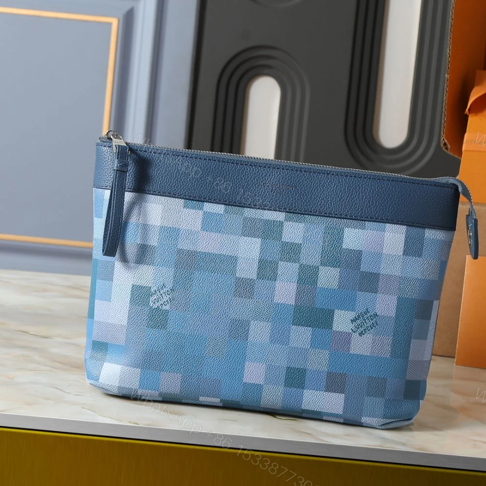 View 2 of Louis Vuitton Pochette Voyage Souple Blue 30Cm M28846