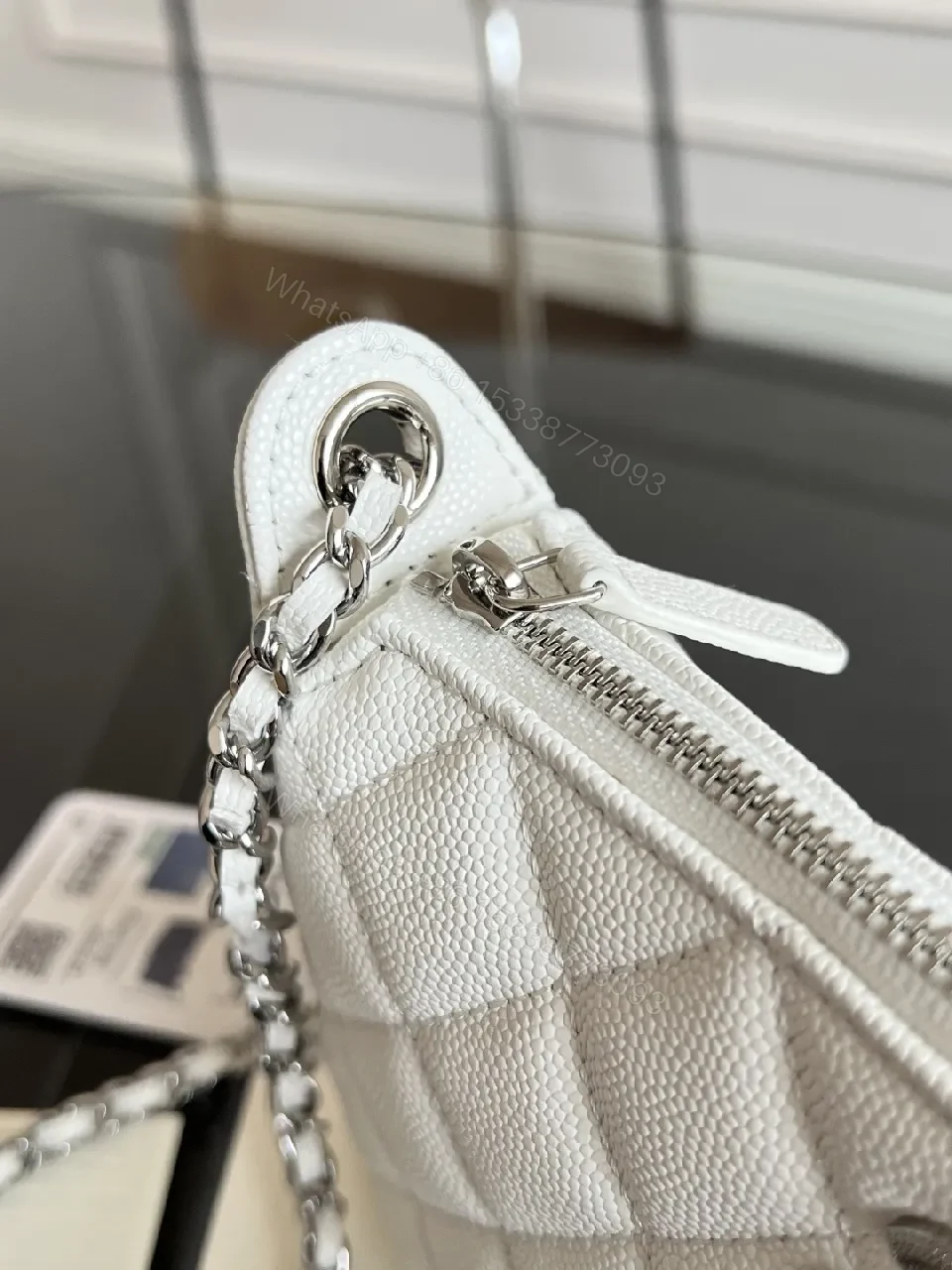 View 7 of Quilted White Mini Bag with Silver Chain - Luxe Compact Style