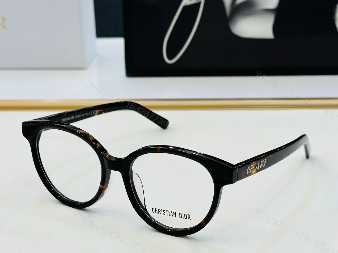 View 9 of Bold Black Round Eyeglasses: Subtle Luxury Eyewear